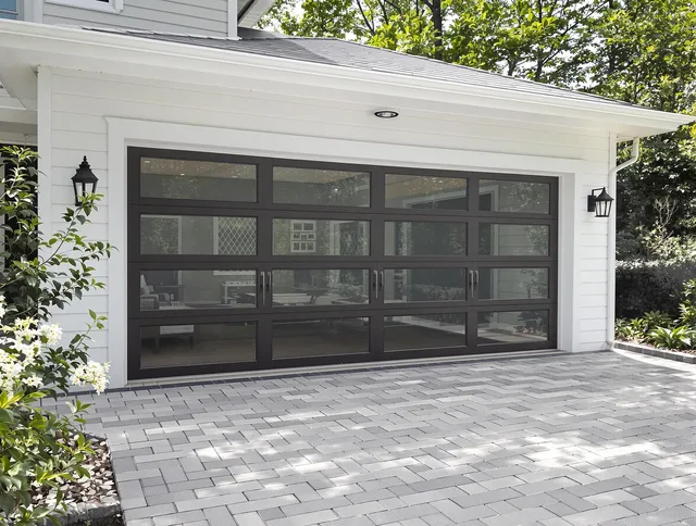 Waxhaw Garage Door Repair design specialist presenting custom garage door options to Waxhaw homeowner