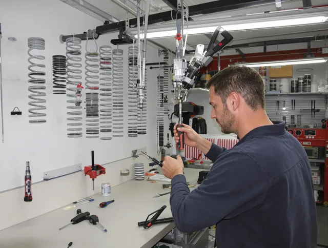 Waxhaw Garage Door Repair safety certified technician performing precision spring replacement in Waxhaw