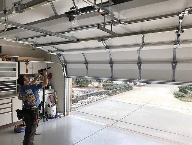 Garage door track repair service by Waxhaw Garage Door Repair in Waxhaw